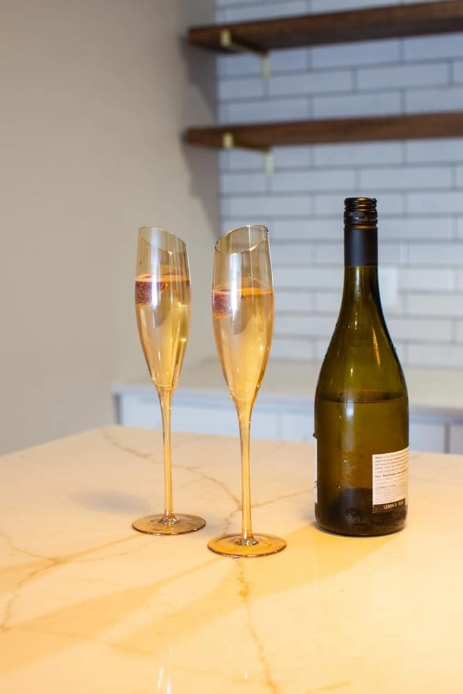 Gold Wine Glasses for Champagne, Set of 2-6oz Champagne Flutes with Slanted Rims, Angled Bowl for Optimal Aeration, Modern, Unique, Decorative Fancy Wine Glasses Set for Women and Men
