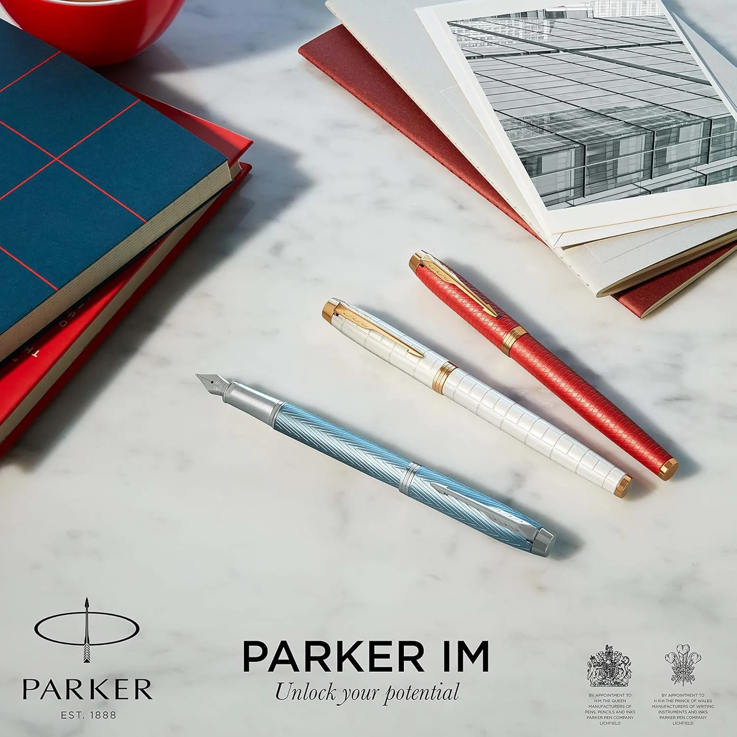 PARKER IM Fountain Pen, Premium Black, Fine Nib with Blue Ink Refill (1931646)
