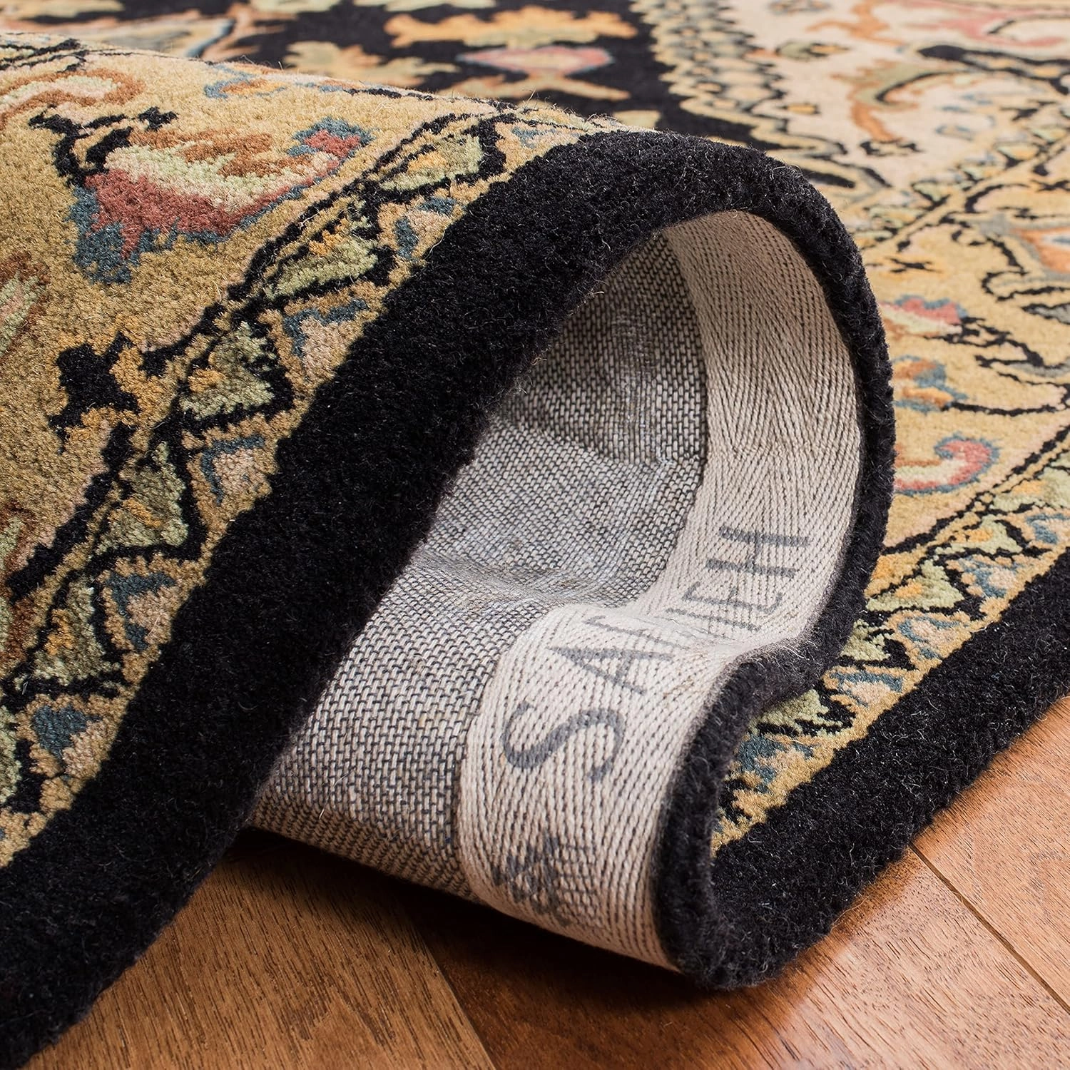 SAFAVIEH Heritage Collection Area Rug - 9' x 12', Black & Gold, Handmade Traditional Oriental Medallion Wool, Ideal for High Traffic Areas in Living Room, Bedroom (HG625Z)