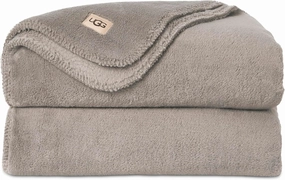 UGG Whitecap Plush Throw Blanket Fleece Lightweight Soft Cozy Throw for Couch Luxury Home Decor for Living Room Machine Washable Hypoallergenic Flannel Blankets, 50-inch x 70-inch, Light Grey Seal
